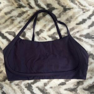 Buffbunny sports bra. Can’t remember the name. Cup pads NOT included.